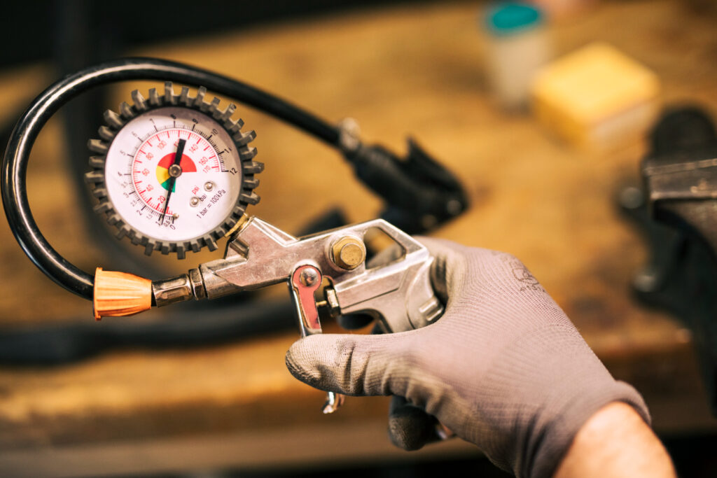 mechanic repairing bicycle